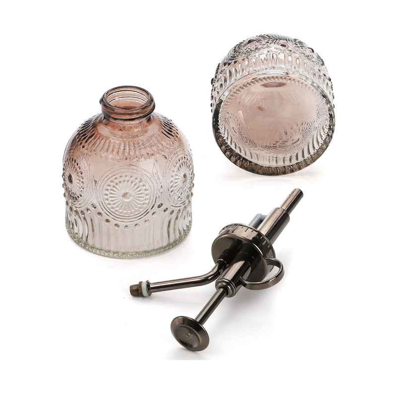 Vintage embossed glass spray bottle with bronze plastic top pump for salon and spa use – Al Basel Cosmetics